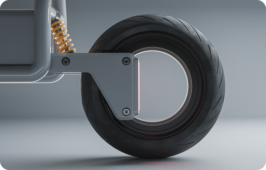 Close-up of a sleek, futuristic wheel design featuring a large circular frame and a modern tire. The wheel is attached to a suspension system with exposed coils, set against a smooth, gray background.